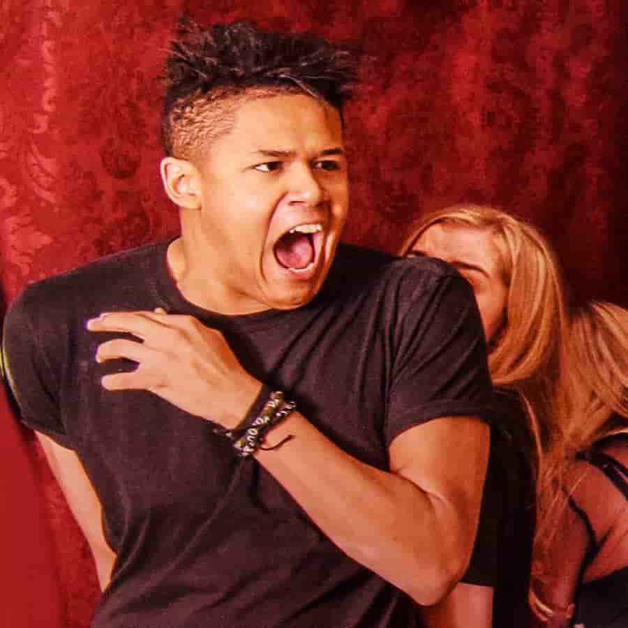 A visitor caught mid-scare during the experience