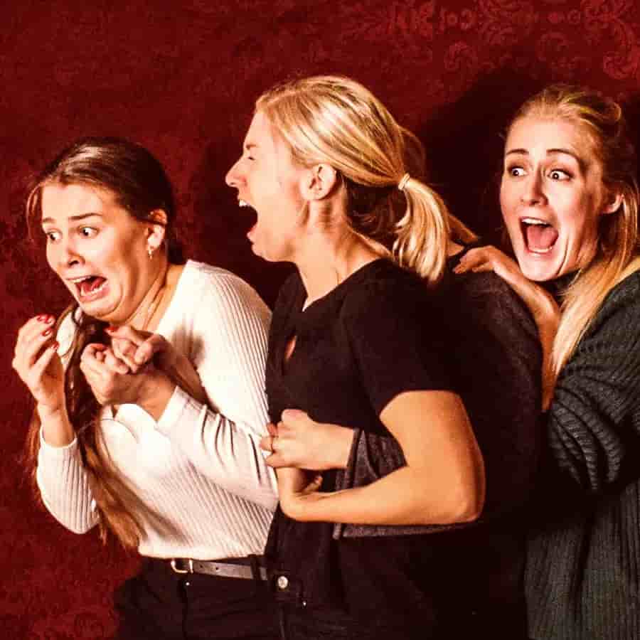 Guest reacting with a genuinely terrified expression